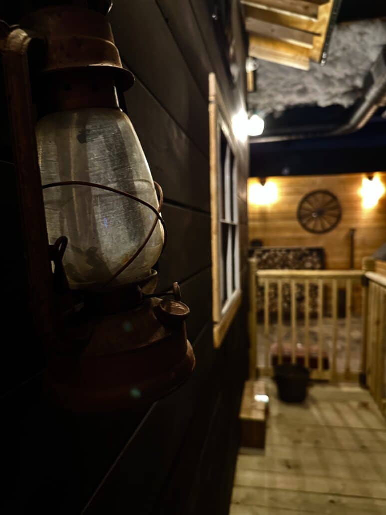 Appalachian Outlaw escape room lantern on porch